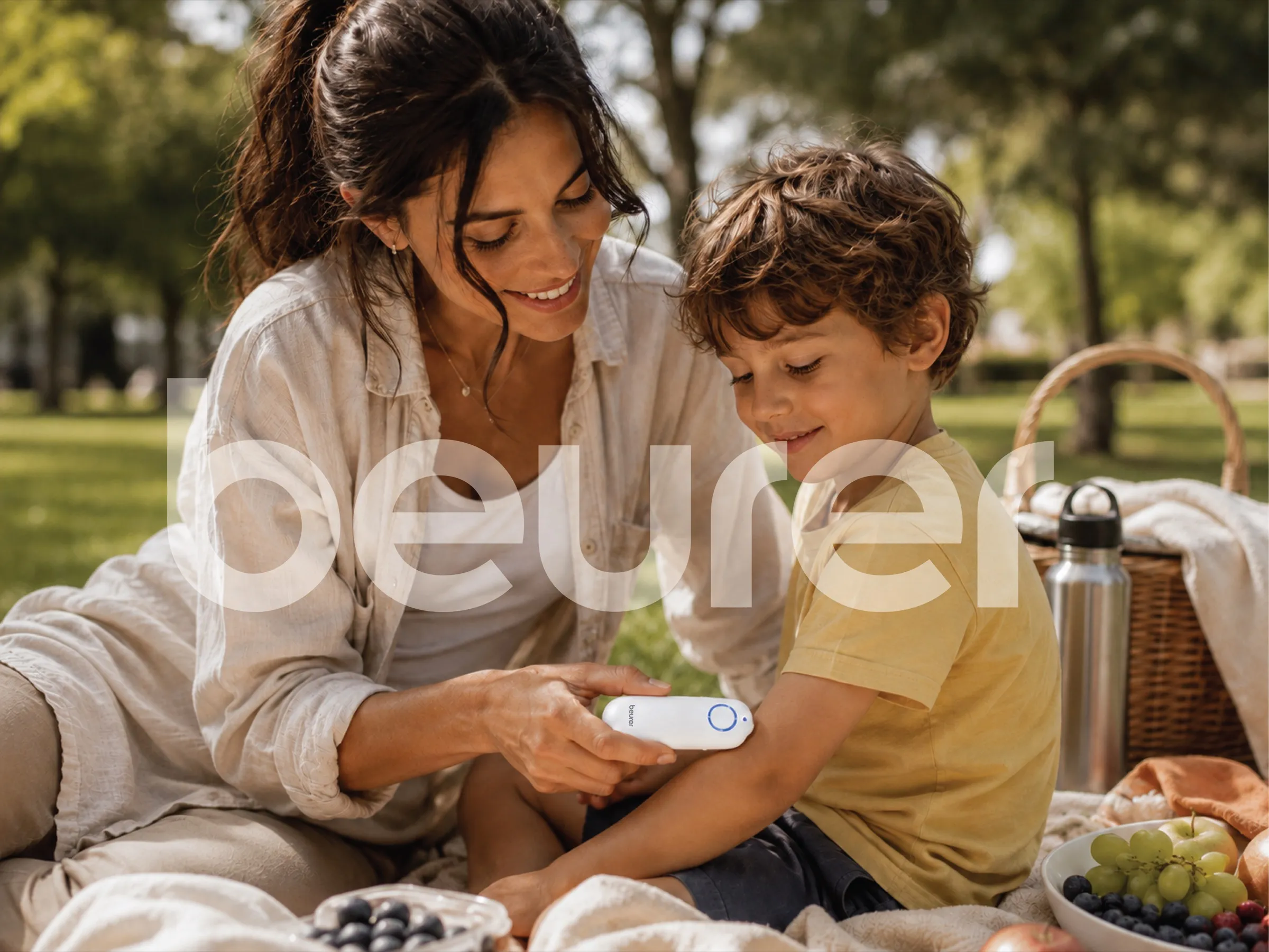 A mother treating her child with the Beurer Insect Bite Healer BR60