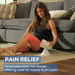 A woman sits on the floow in a living room, IL11 targets her knee to relieve muscle pain