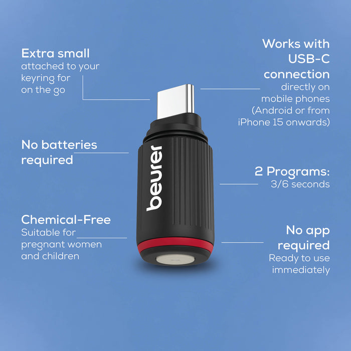 A black and red Beurer USB-C keying adapter shown on a blue background with white text callouts describing its features, including extra small size, USB-C connection compatibility, no batteries required, chemical-free, and quick programming.