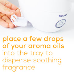 For an aromatic experience place a few drops of aroma oils into gray to disperse soothing fragrance around the room Beurer 2 in 1 oil diffuser and humidifier LB37